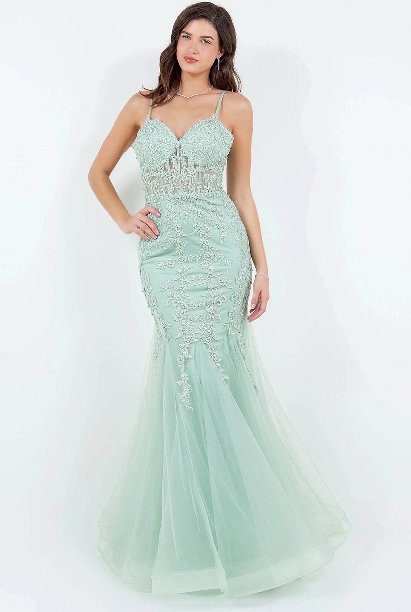 Sage mermaid gown styled with sweetheart neckline and spaghetti straps