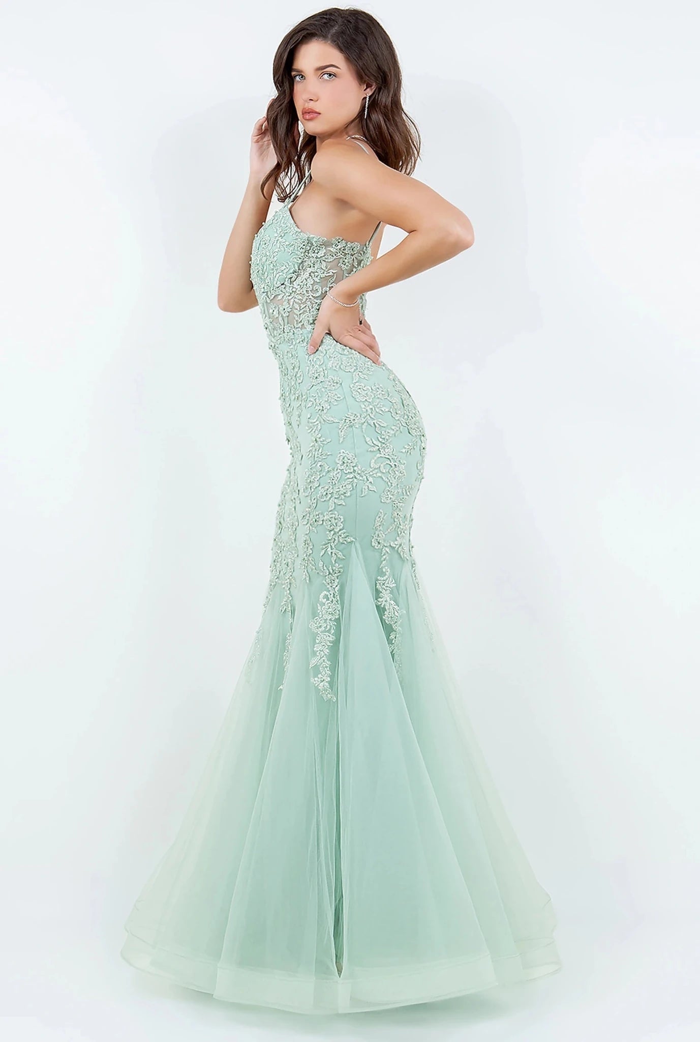 Sage mermaid gown showcasing tulle overlay flaring from hips into mermaid silhouette