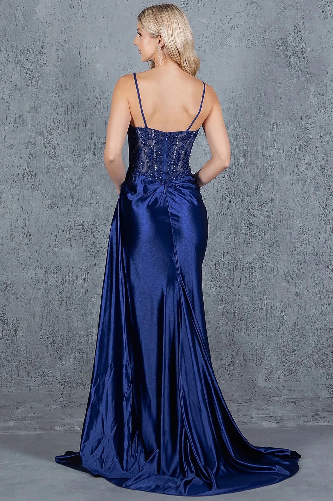 Navy prom dress completed with dramatic train extending from back of skirt
