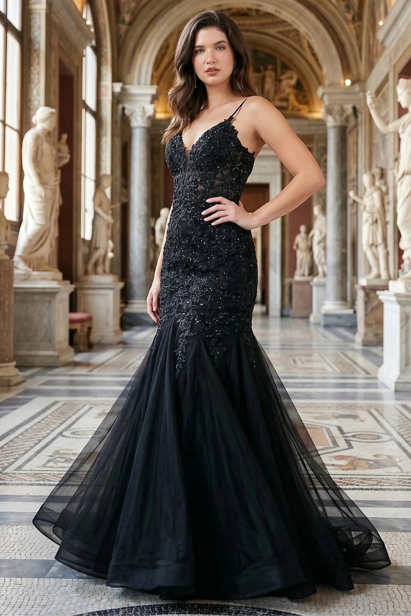 Black prom dress completed with embroidery extending down skirt