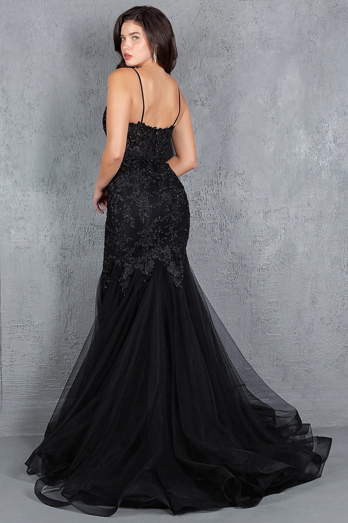 Black prom dress designed with zipper back closure