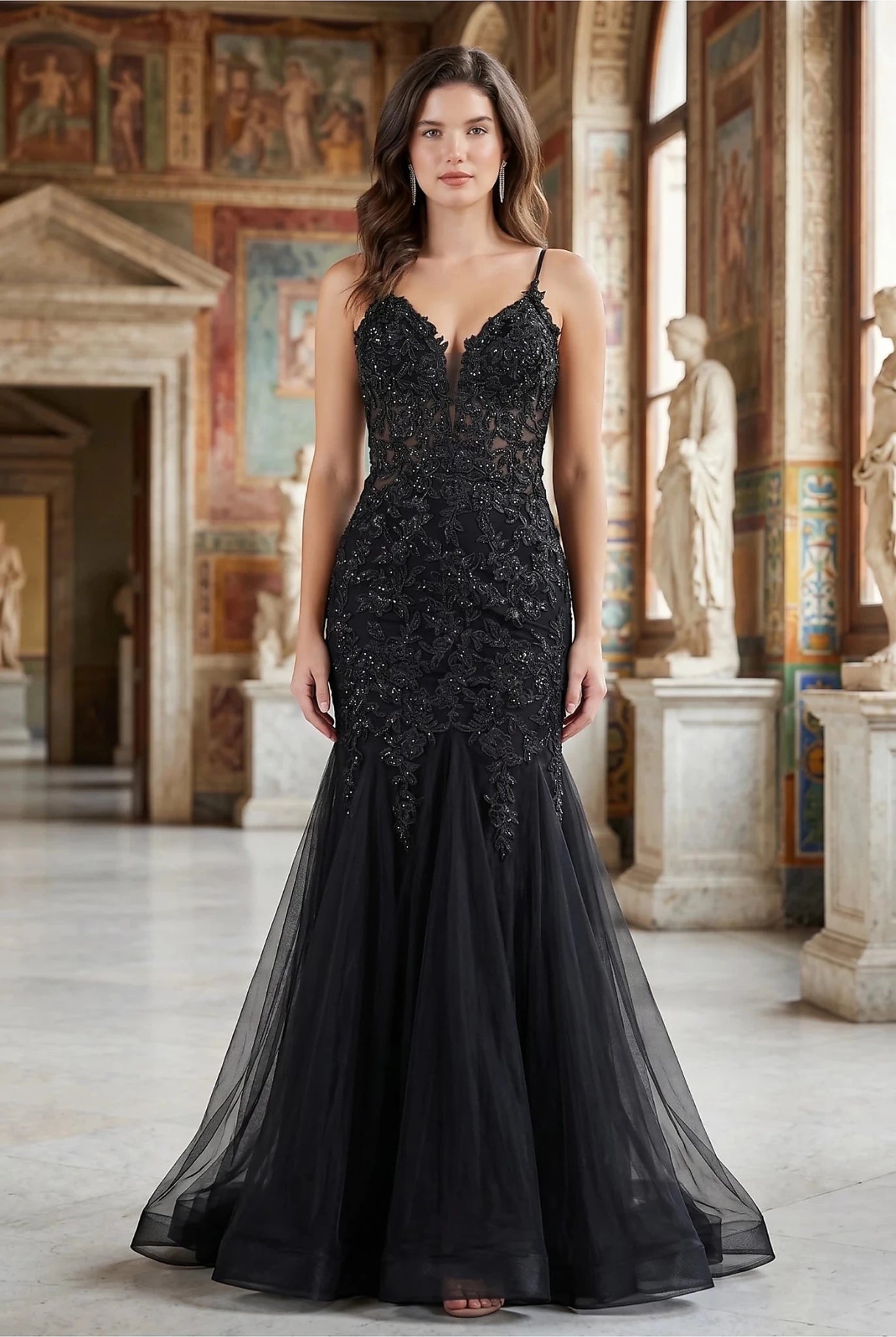 Black prom dress with plunging V-neckline and spaghetti straps