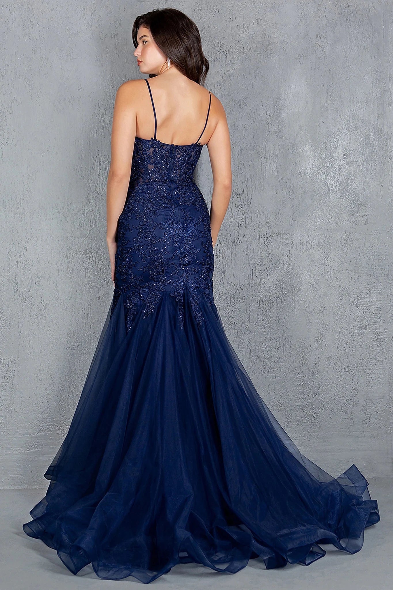 Navy prom dress designed with zipper back closure