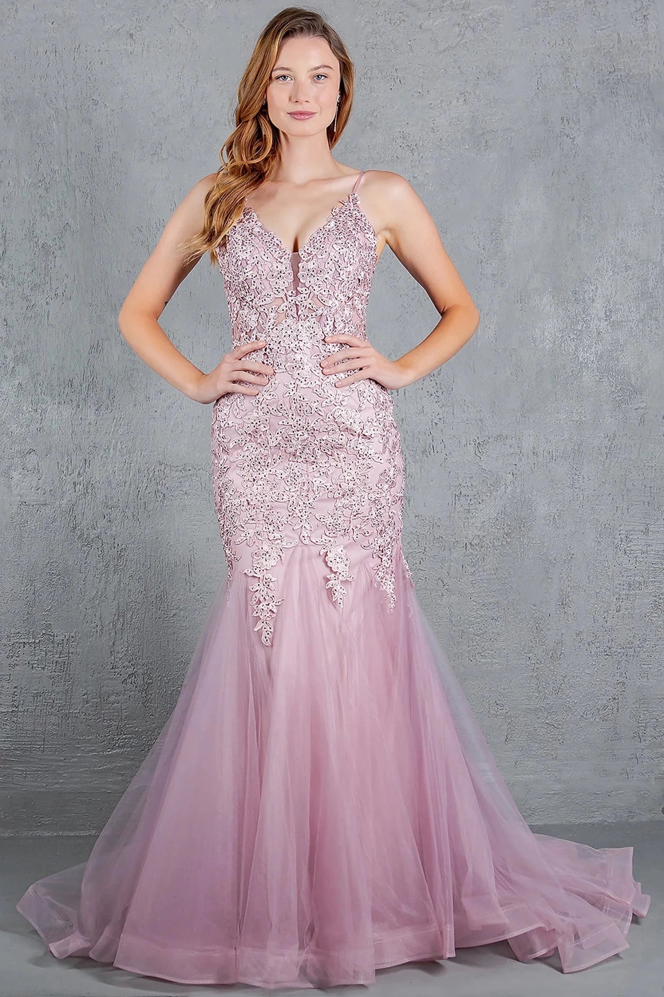 Rose gold prom dress showcasing fitted silhouette with voluminous tulle skirt