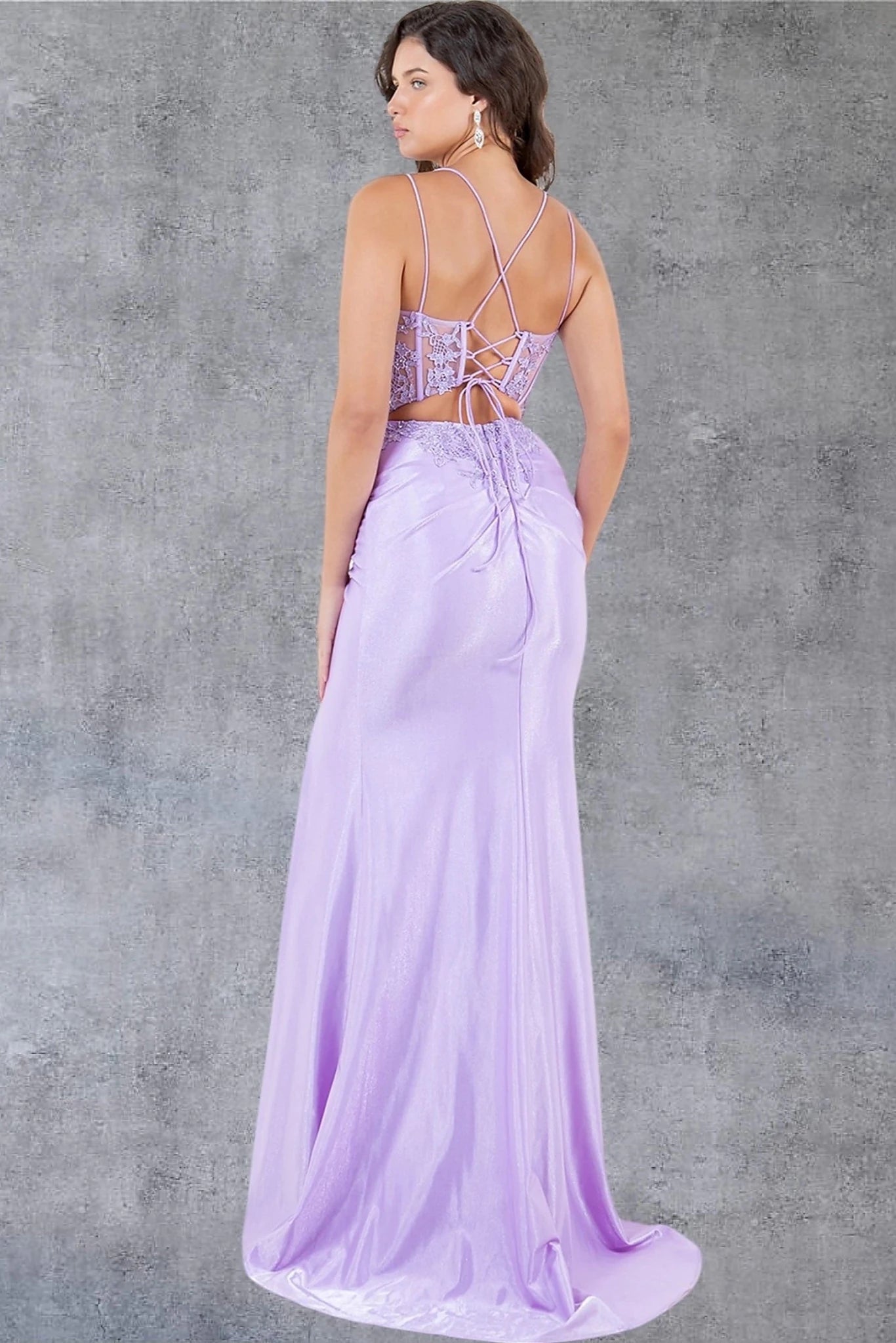 Lilac prom dress completed with lace-up back and zipper closure