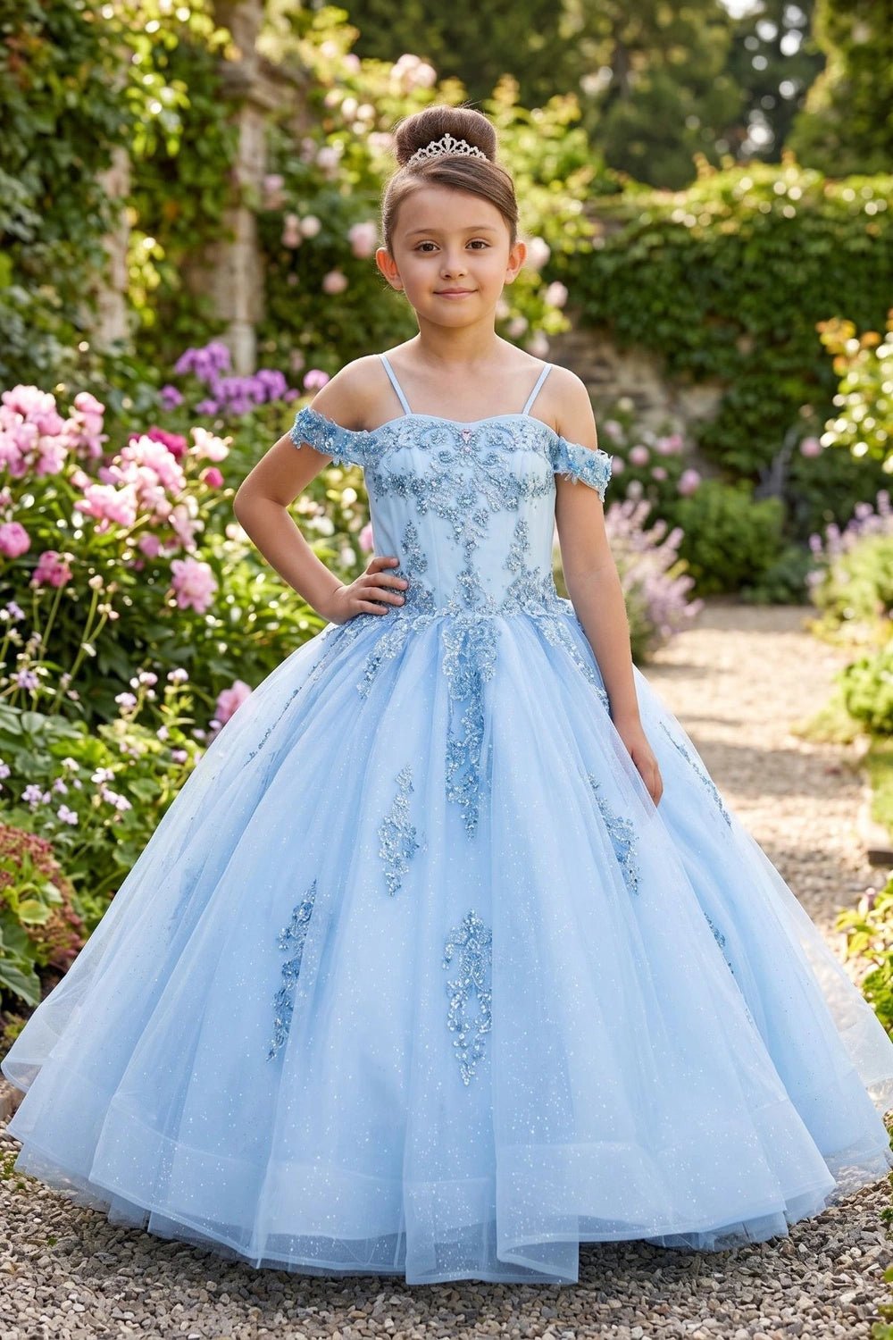 Shown in a front view, the Blue mini quince dress has off-shoulder lace bodice, thin straps and a full tulle skirt.