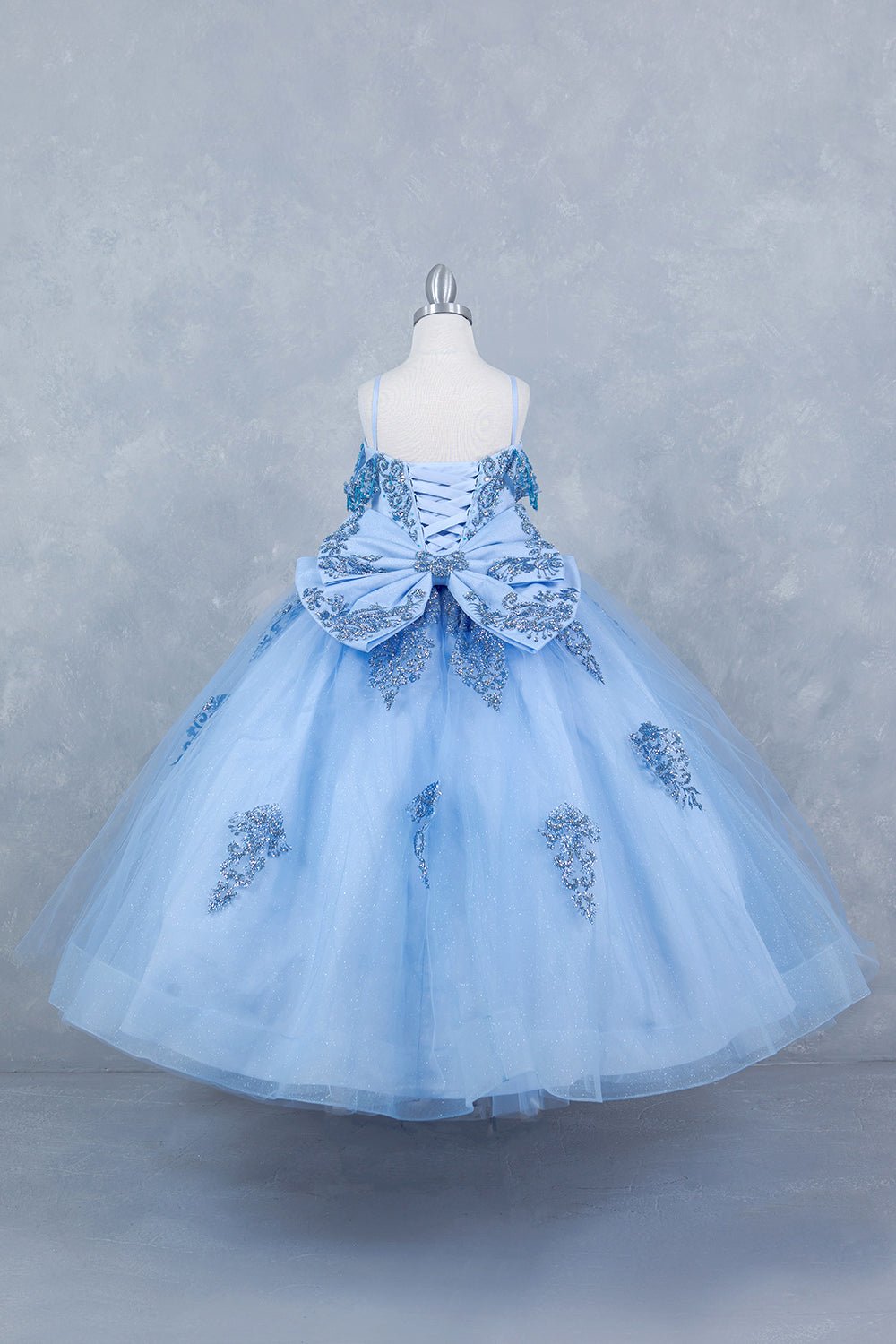 Blue back view kids mini quinceañera mini quince dress with sparkle bead details and layered tulle skirt.