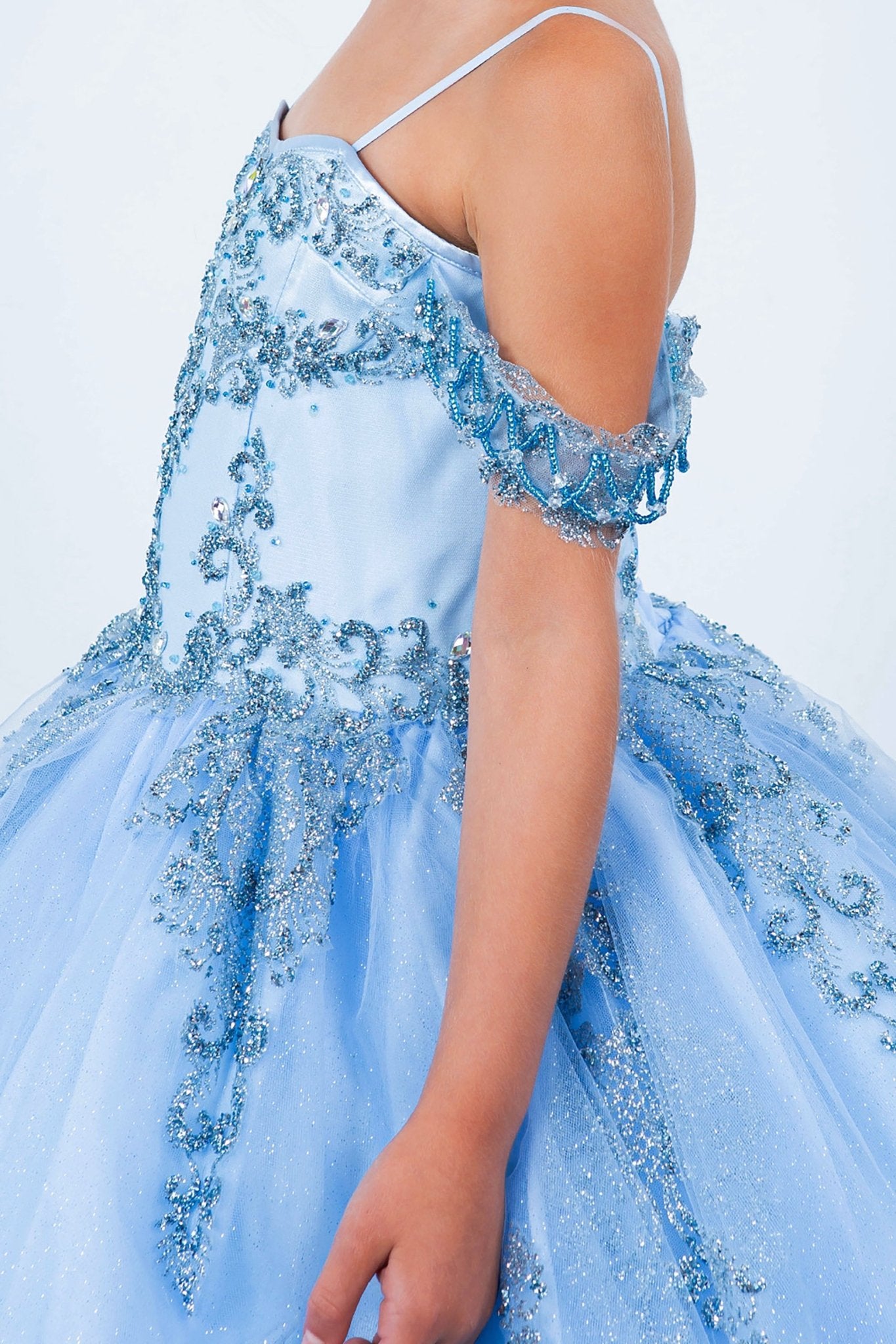 Blue side zoom kids mini quinceañera mini quince dress with sparkle bead details and layered tulle skirt.