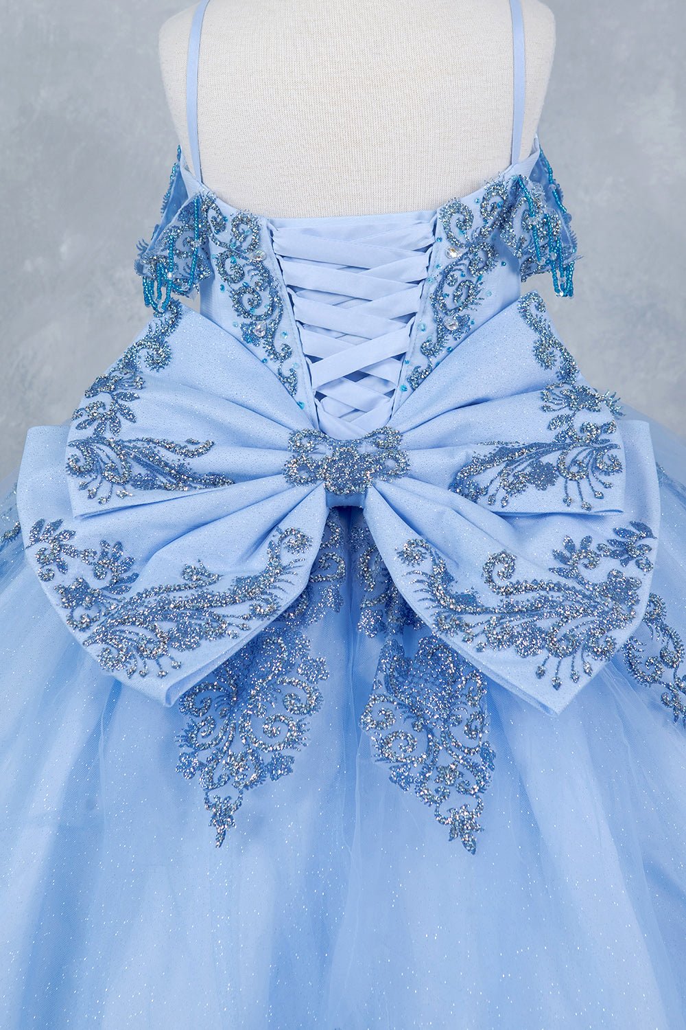 Blue back zoom kids mini quinceañera mini quince dress with sparkle bead details and layered tulle skirt.