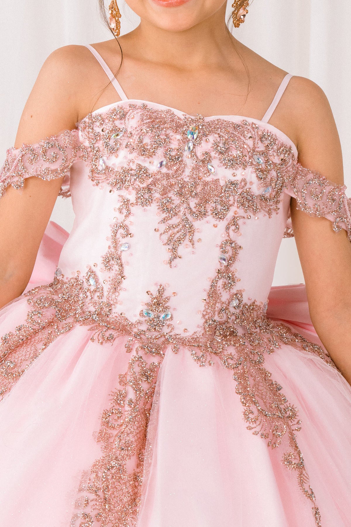 Pink front view kids mini quinceañera mini quince dress with sparkle bead details, beaded embroidery and layered tulle skirt.