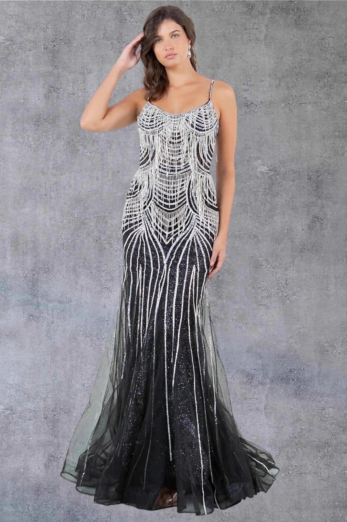 Black evening gown with scoop neckline and spaghetti straps