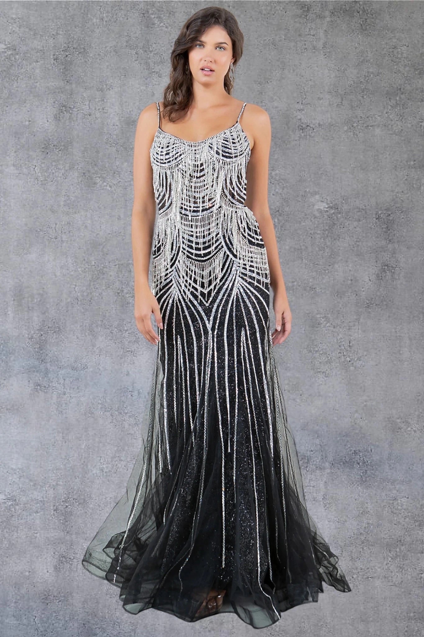 Black evening gown completed with structured hem using horsehair finish