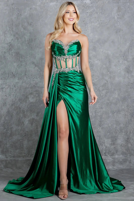A full-length view of a woman wearing green formal prom dress with a tailored silhouette.