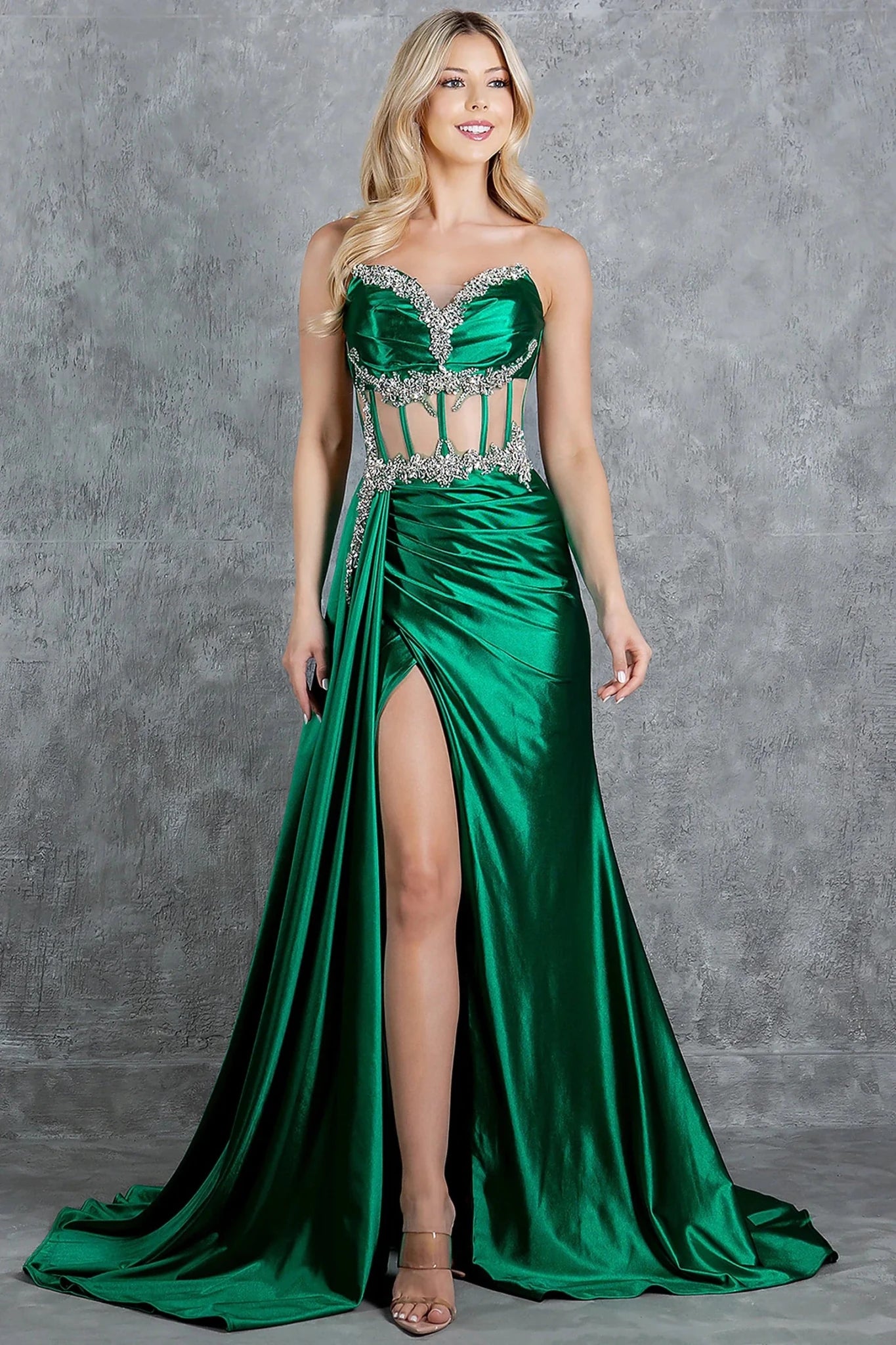 Emeral Green prom dress showcasing high slit along skirt for movement