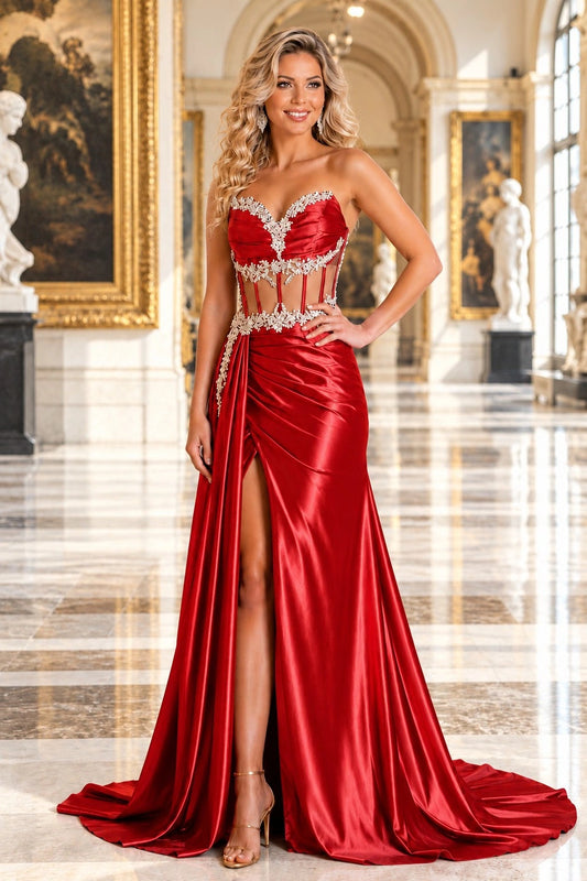 Shown in a front view, the Red prom dress has silver crystal trim, sweetheart neckline and high satin skirt slit.
