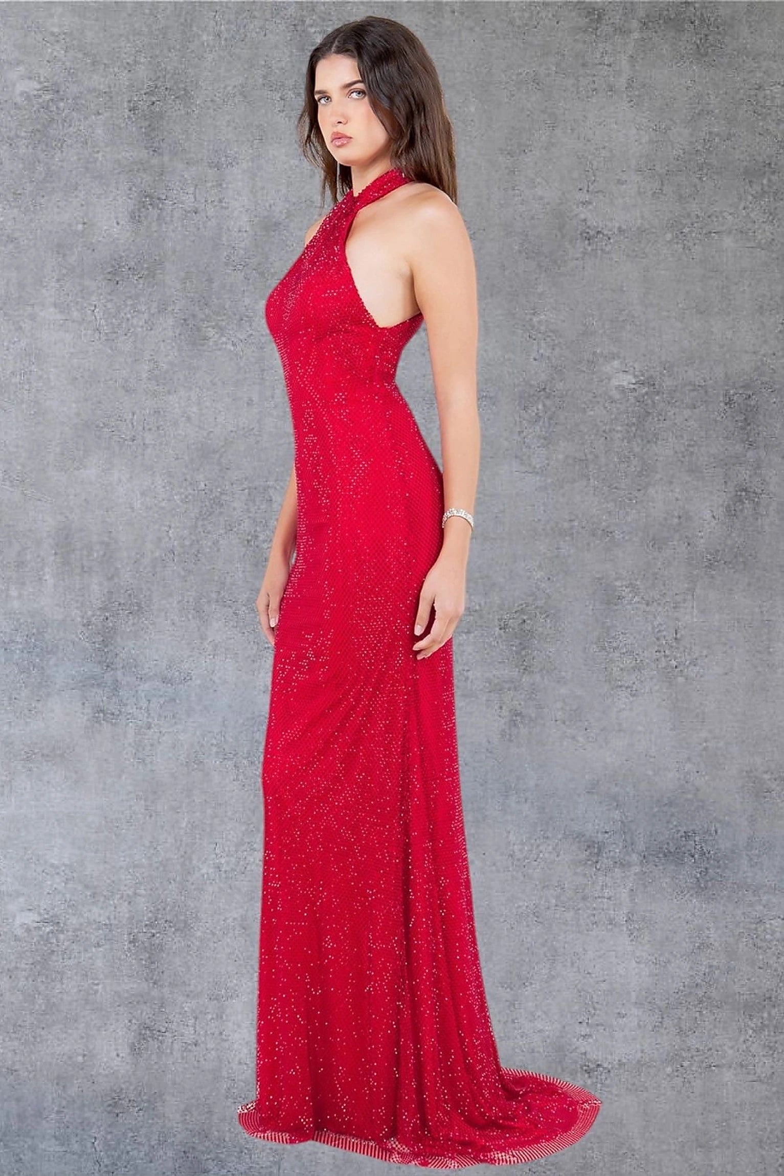 Red evening dress styled with fitted silhouette hugging curves