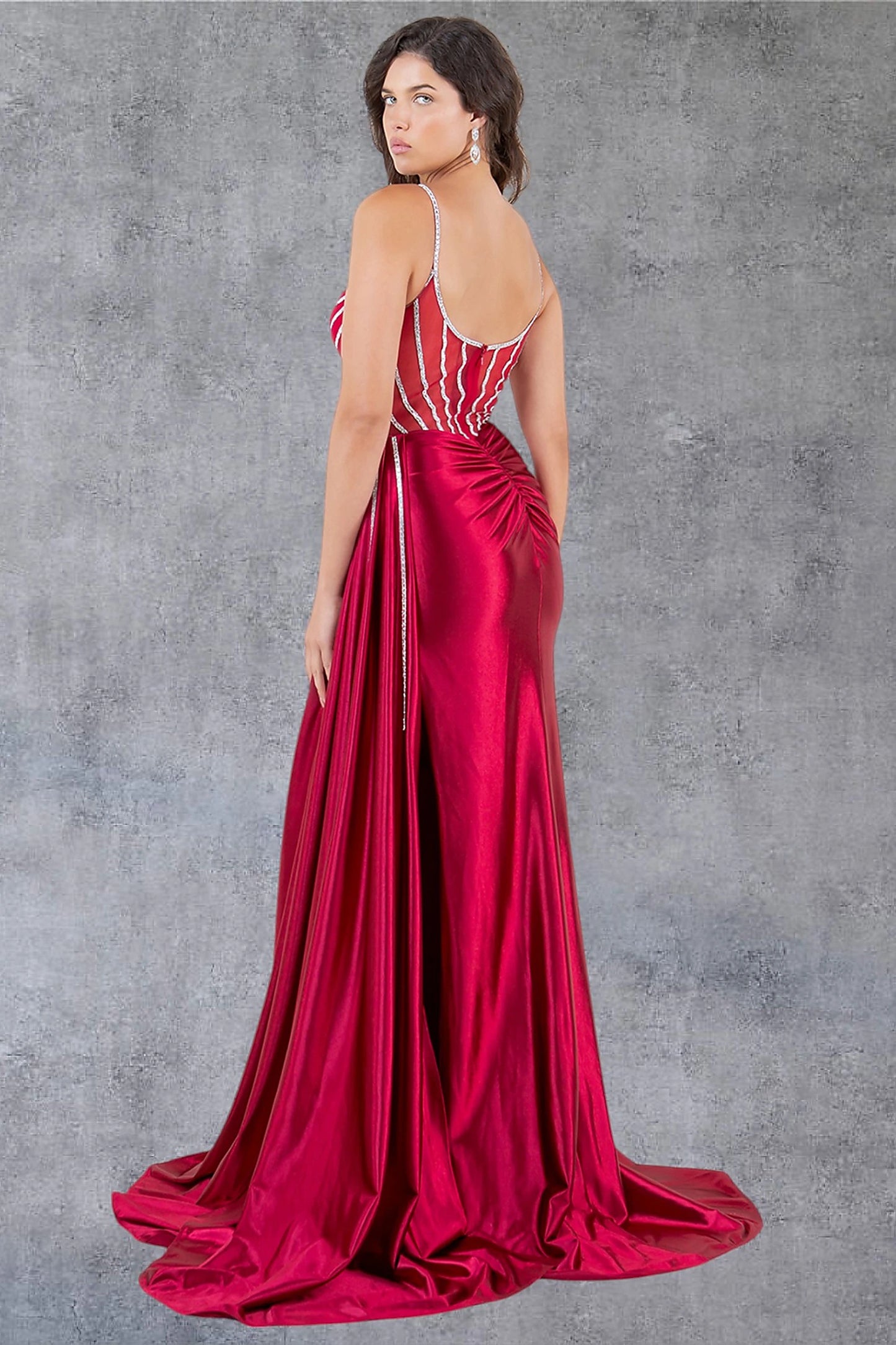 Red prom dress designed with zipper back closure