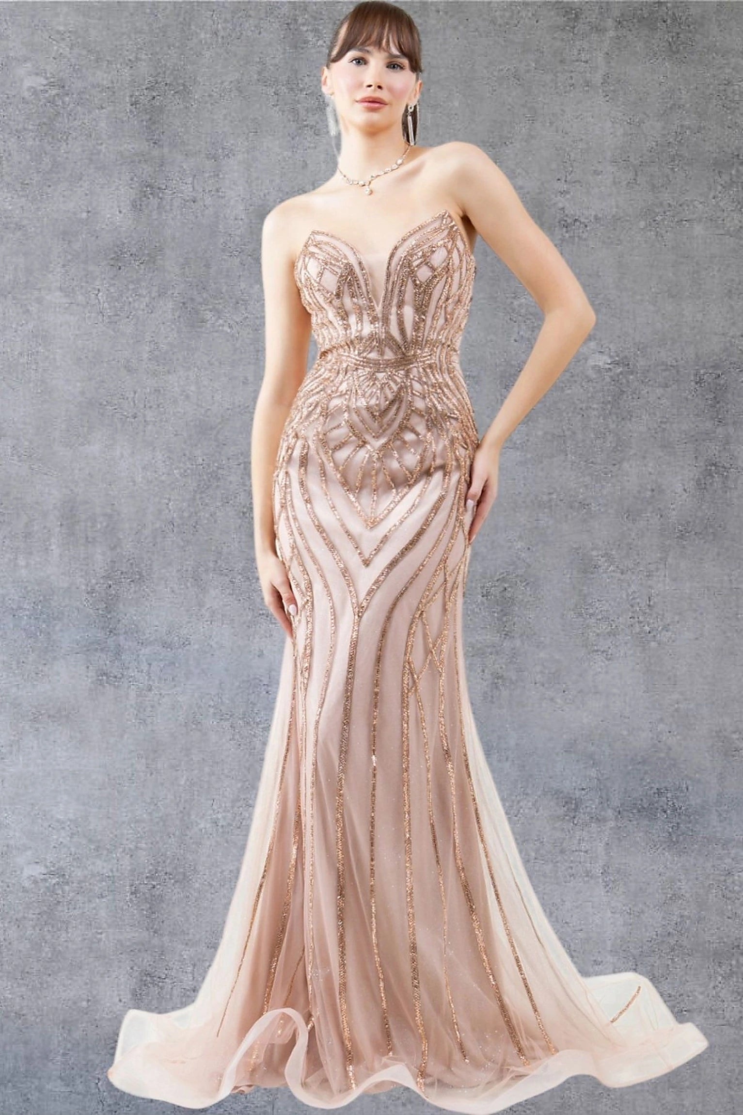 Rose Gold evening dress styled with form-fitting silhouette accentuating waist