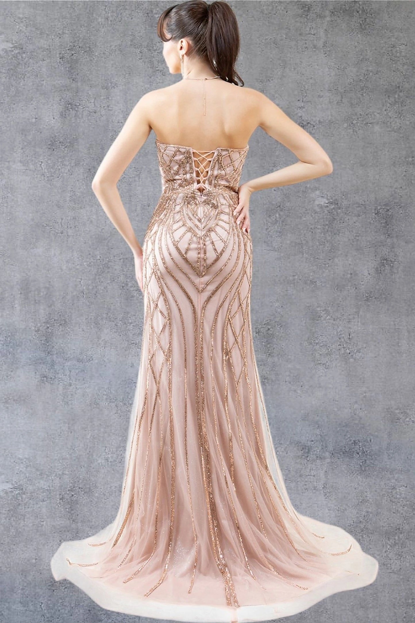 Rose Gold evening dress showcasing floor-length skirt with sheer overlay hem