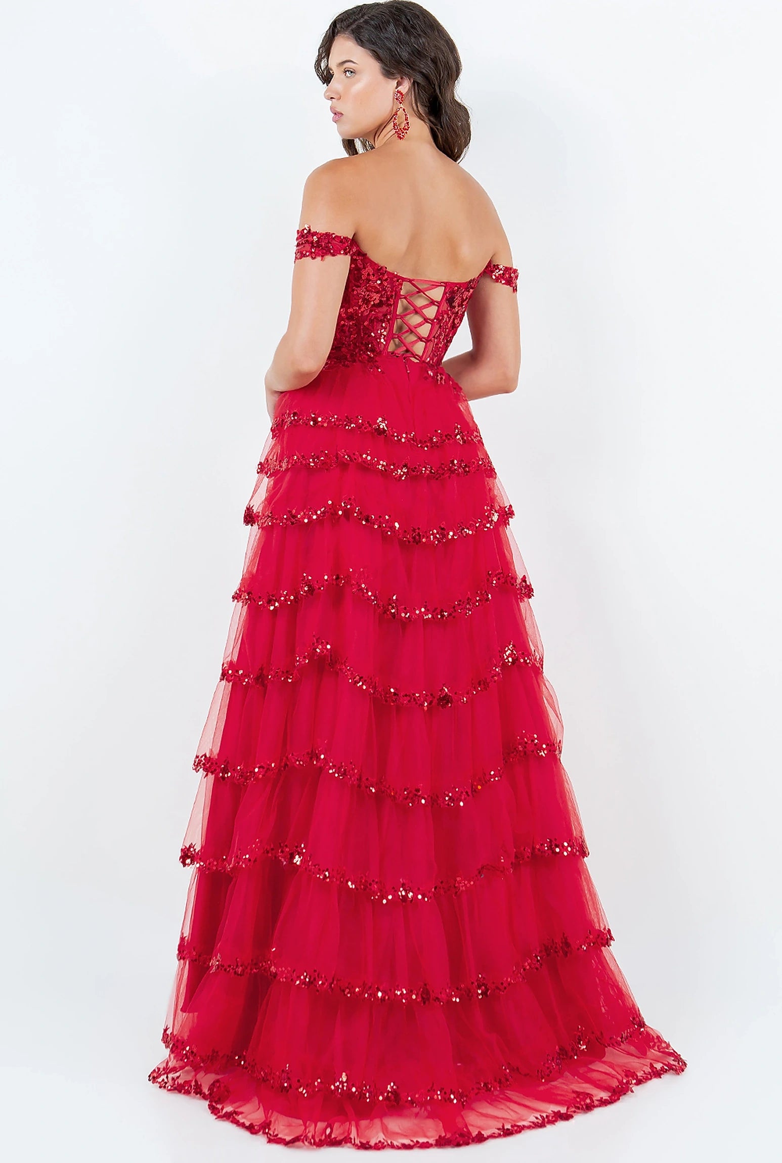 Red prom dress designed with corset lace-up back and zipper closure