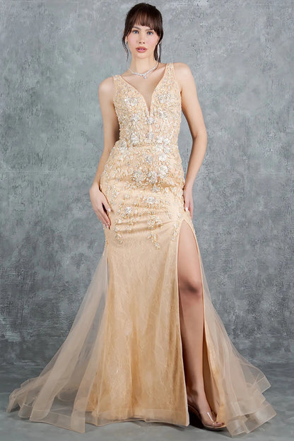 A full-length view of a woman wearing champagne formal dress with lace-up closure.