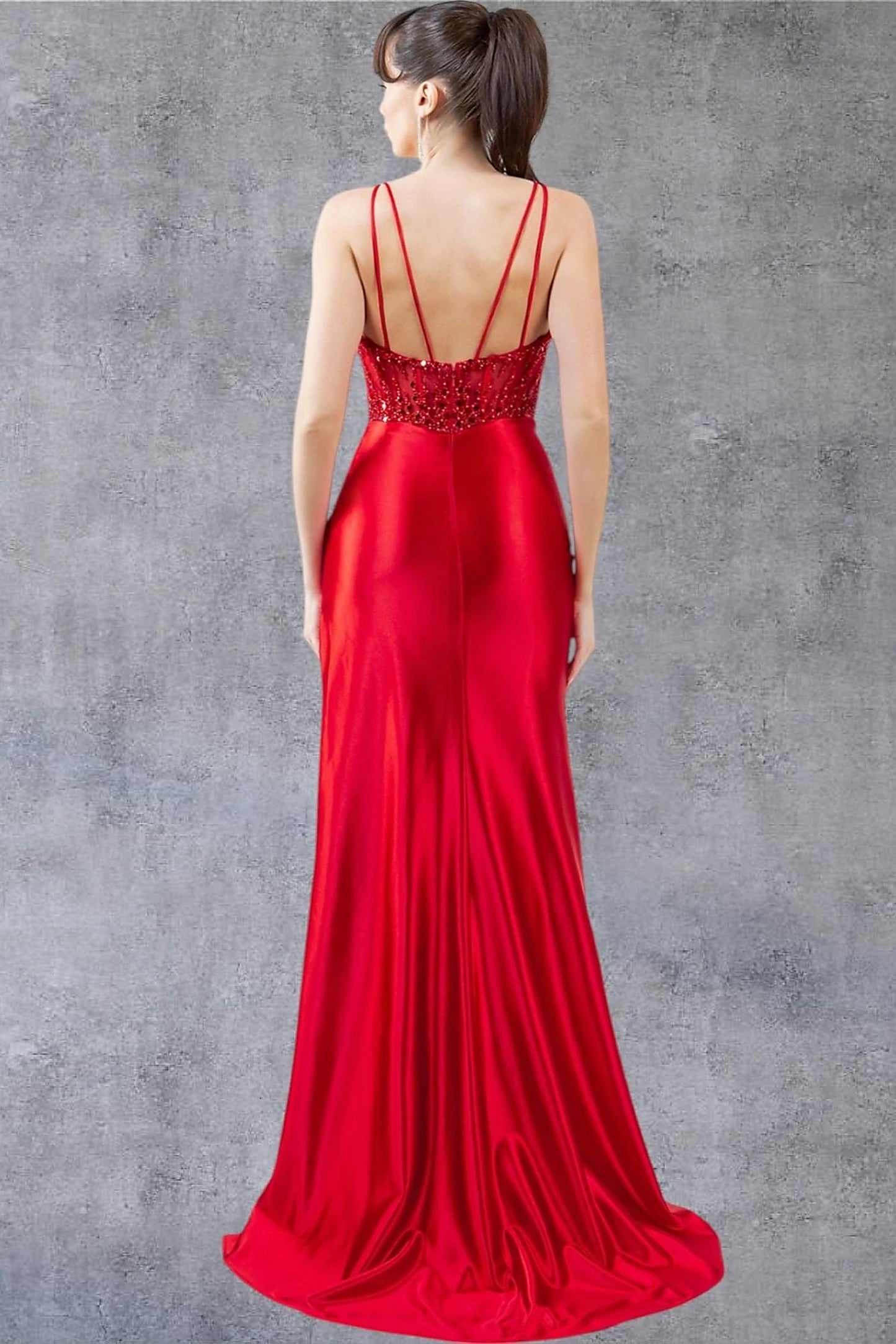 Red prom dress designed with zipper back closure