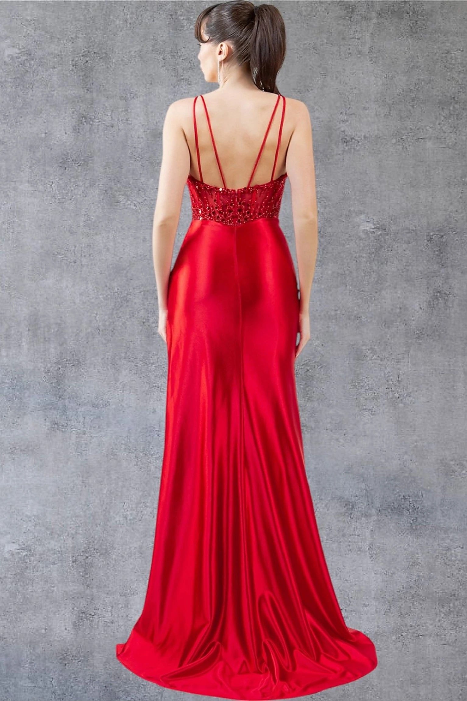 Red prom dress designed with zipper back closure