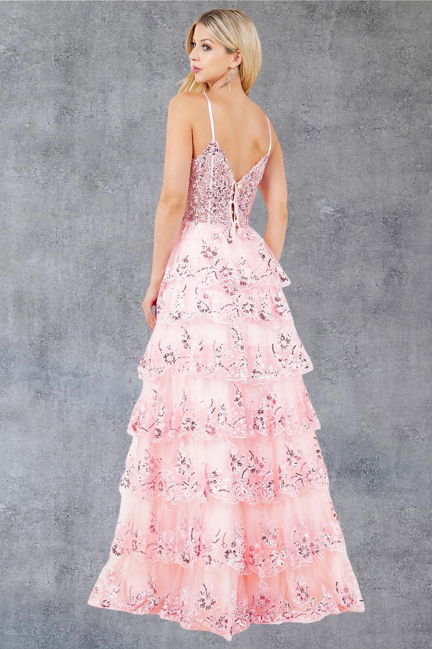 Pink prom dress designed with corset lace-up back and zipper closure