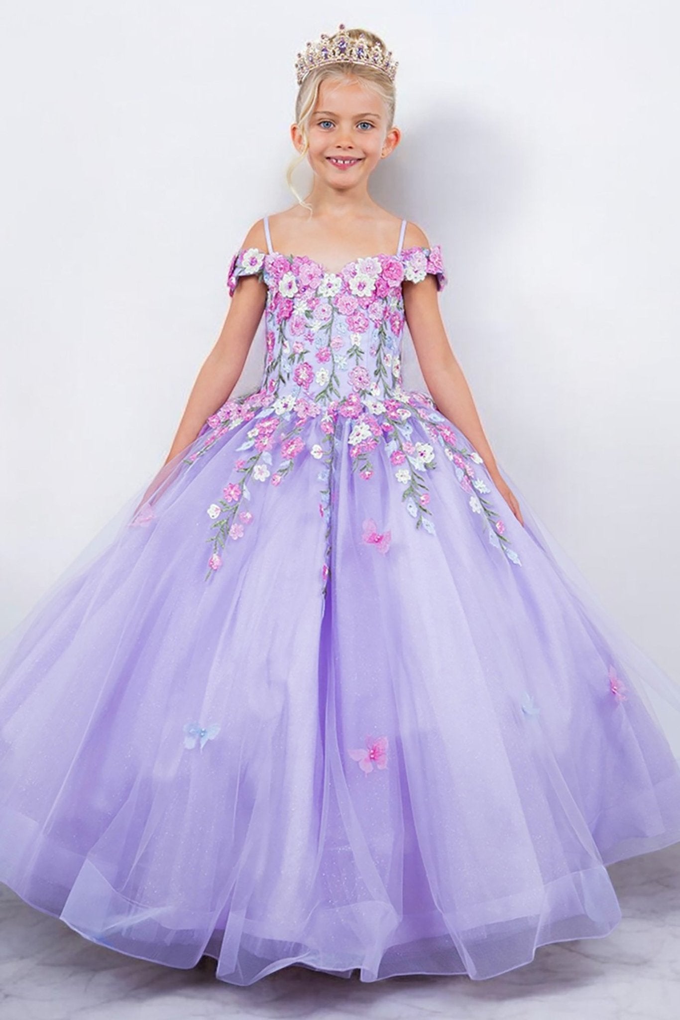 Lilac front view kids mini quinceañera mini quince dress with multicolor daisy embroidery and large detachable bow.