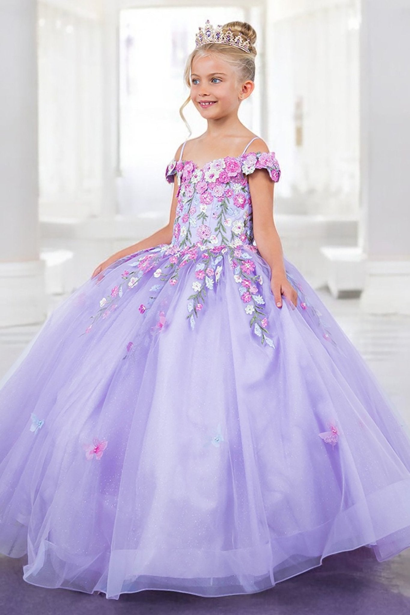 Lilac side view kids mini quinceañera mini quince dress with multicolor daisy embroidery.