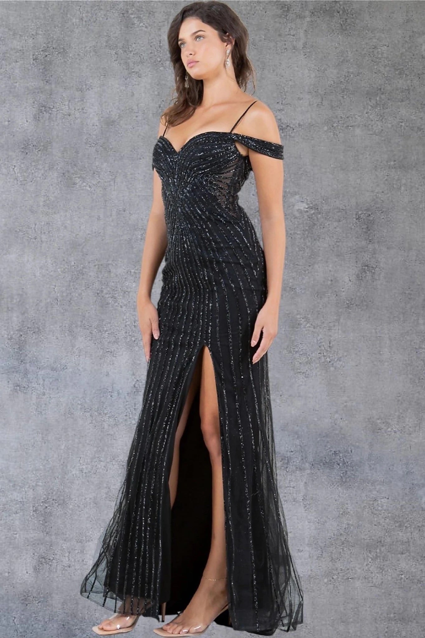 Black evening dress showcasing floor-length silhouette with thigh-high slit