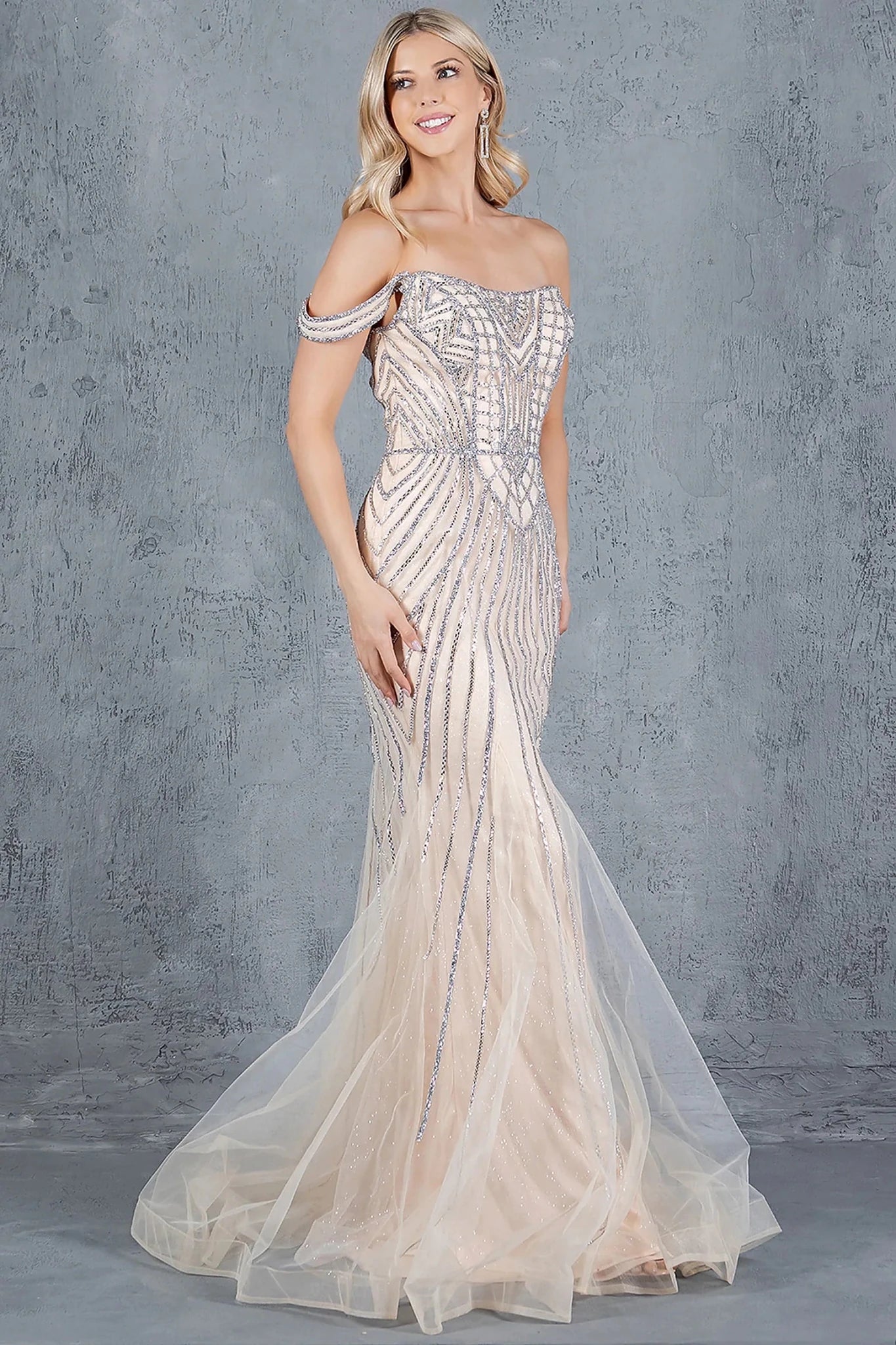 Champagne prom dress designed with sheer tulle overlay flowing to floor length