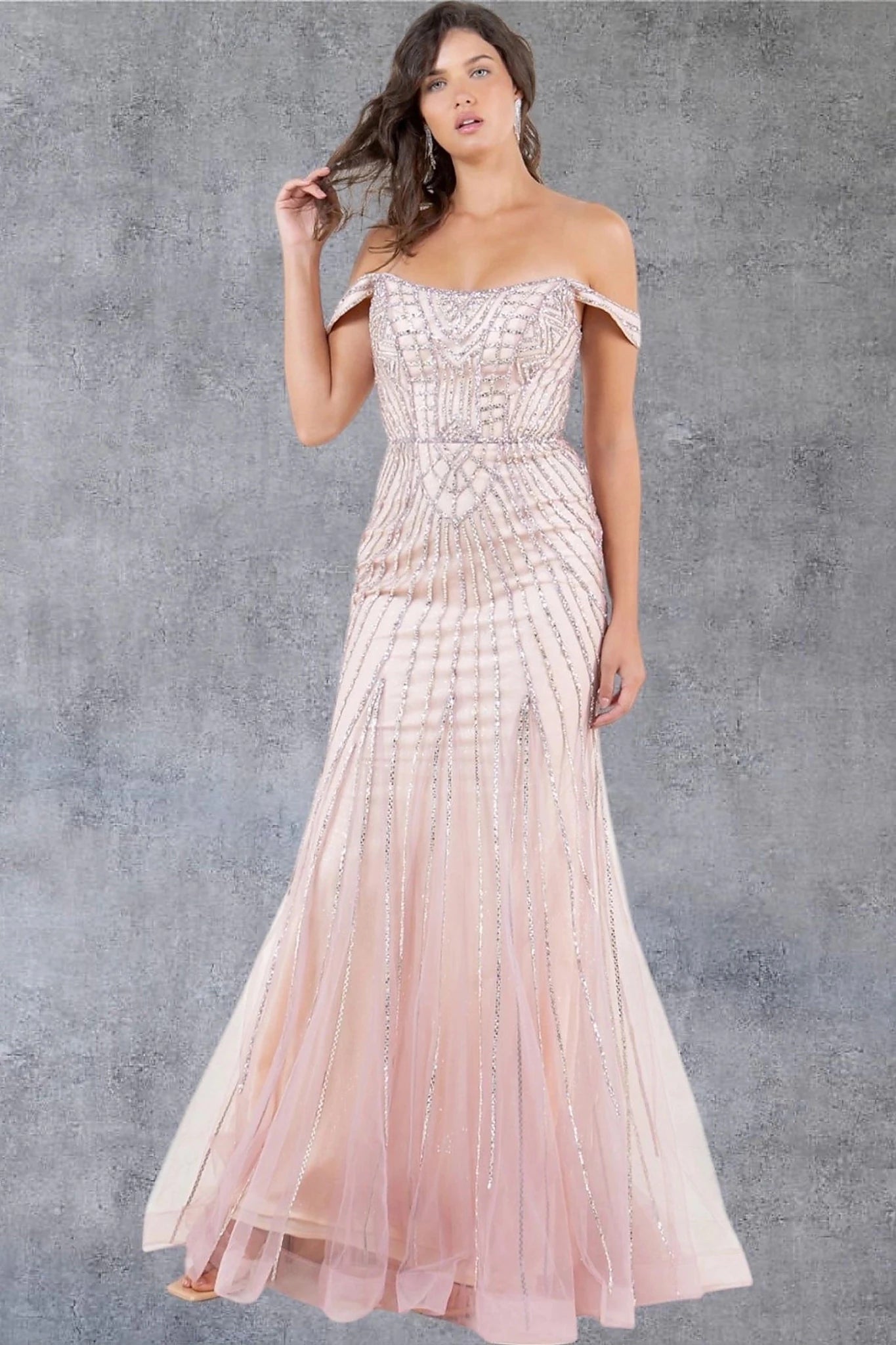 Rose gold prom dress styled with vertical stone beading across bodice and skirt