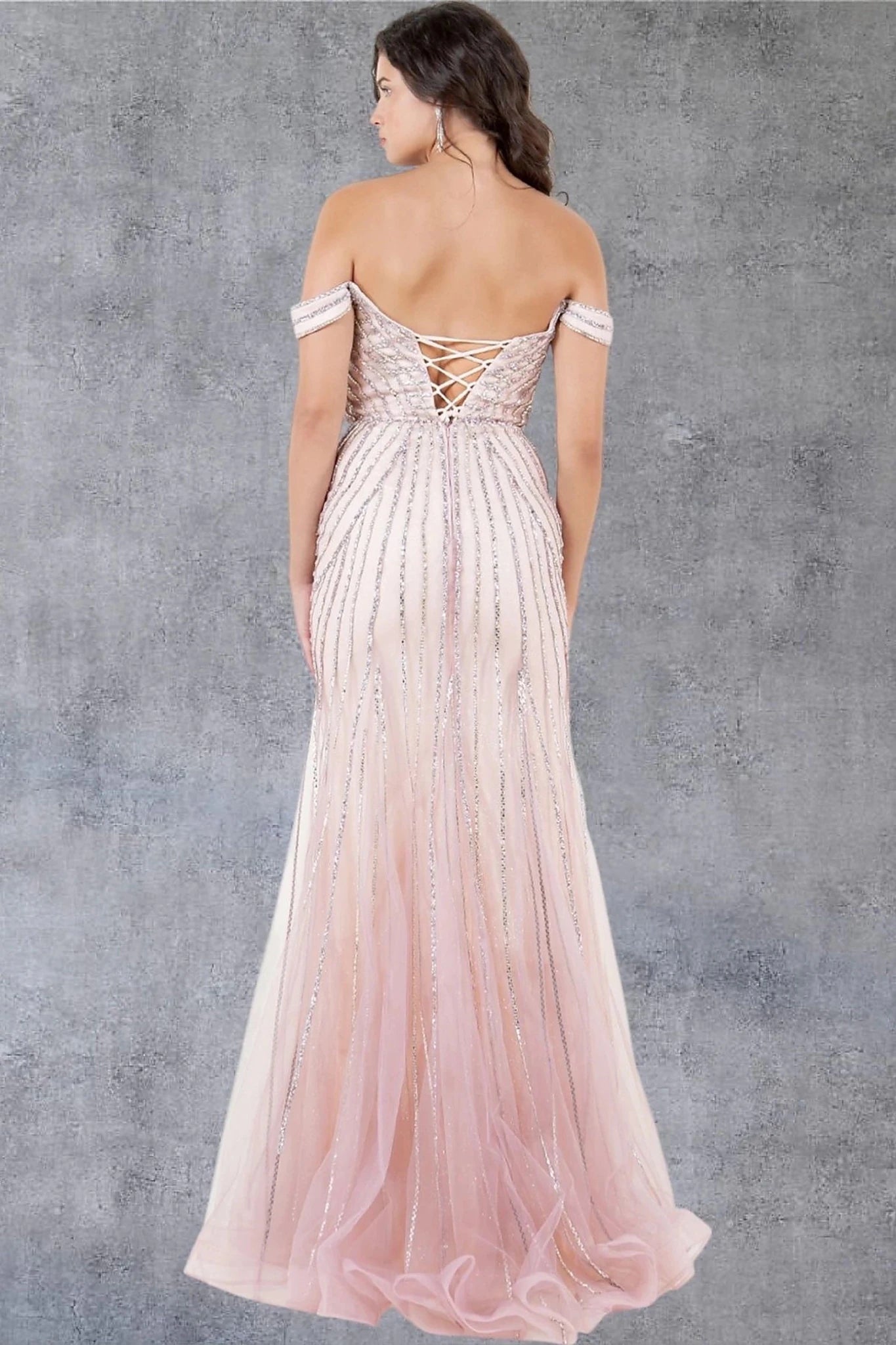 Rose gold prom dress completed with lace-up corset back and zipper closure