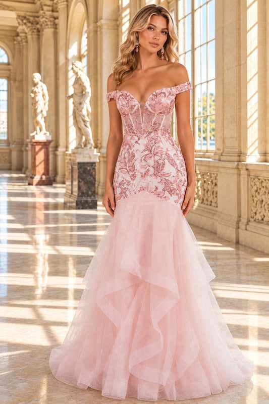 Shown in a front view, the Blush prom and evening dress has off-shoulder lace bodice and tiered mermaid skirt.