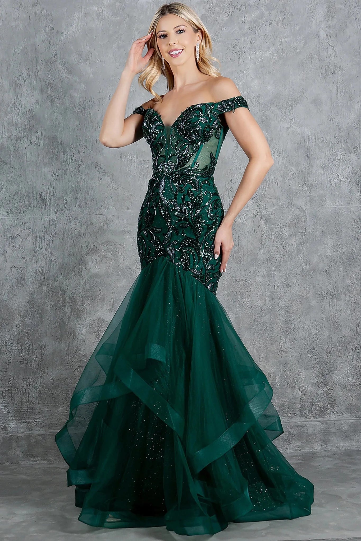 Hunter Green evening dress showcasing layered tulle mermaid skirt with voluminous design
