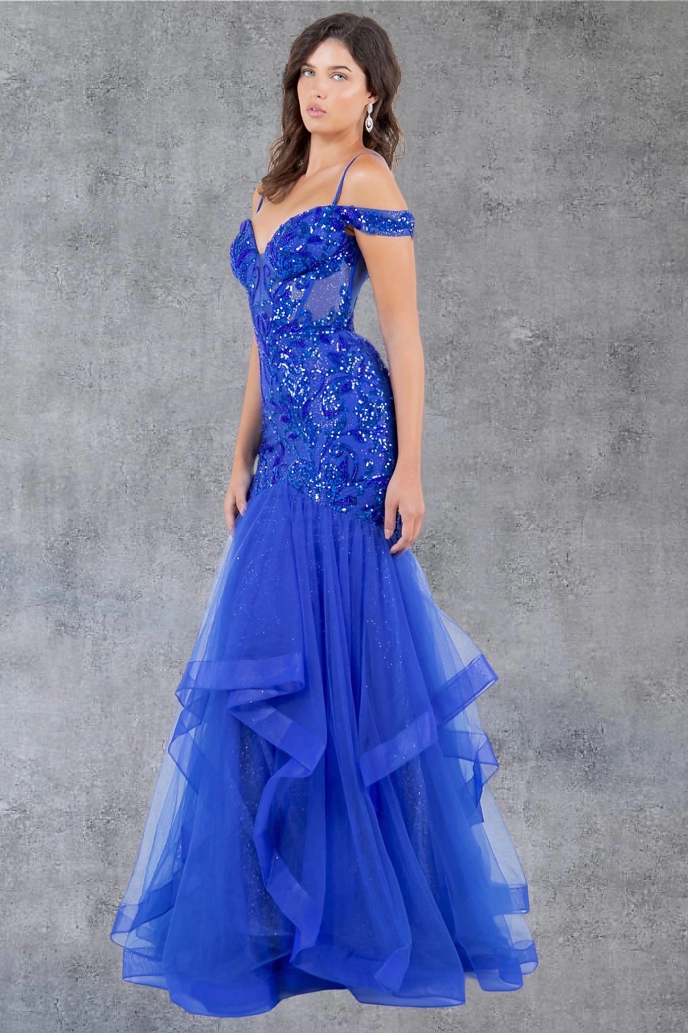 Royal Blue evening dress showcasing layered tulle mermaid skirt with voluminous design