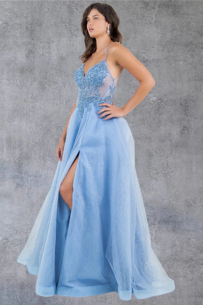 A side profile view of a woman wearing a blue A-line prom dress, emphasizing the flowing silhouette.