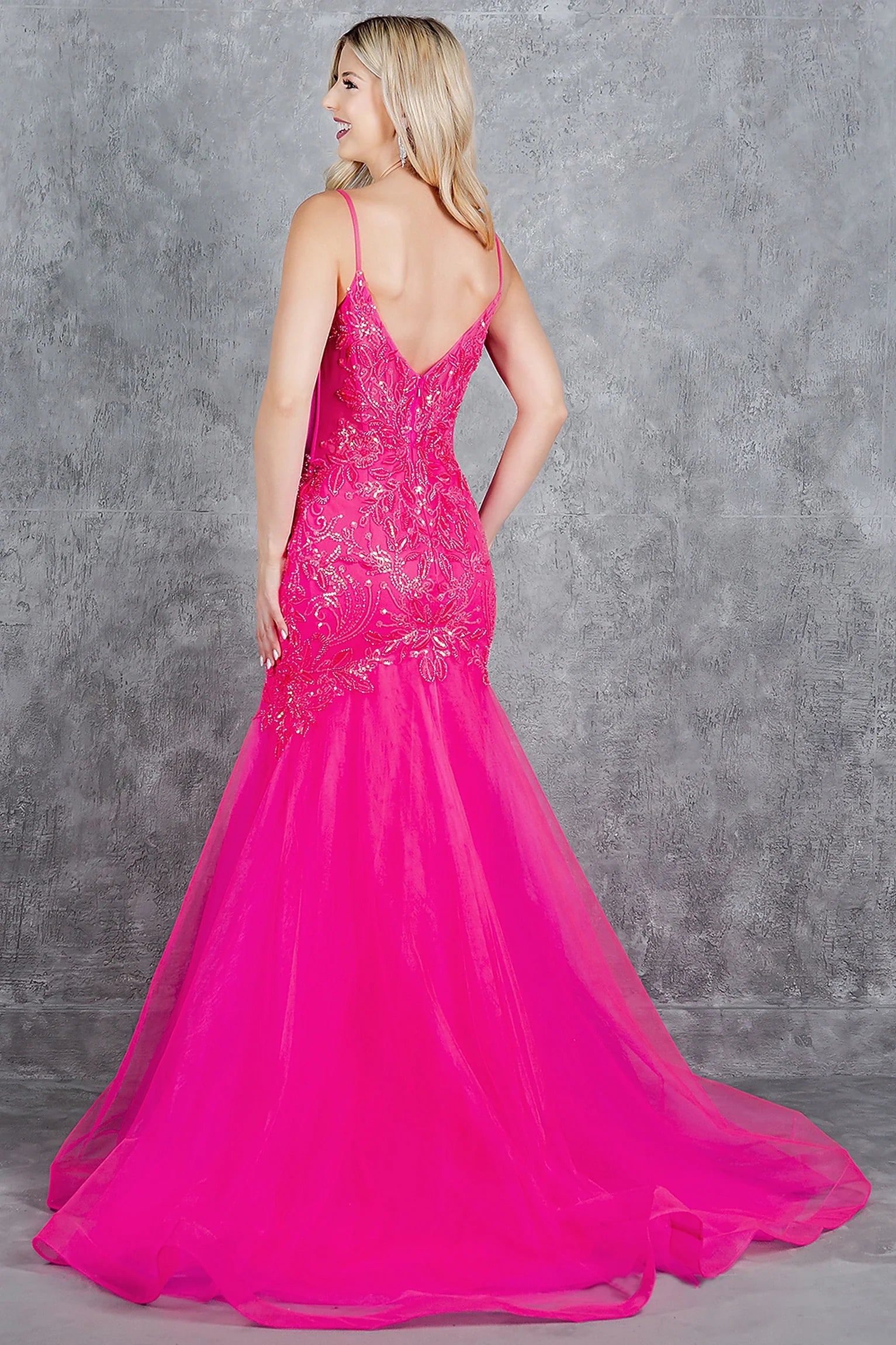 Fuchsia tulle mermaid prom dress designed with low V-shape back and zipper closure