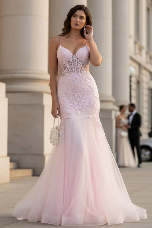 Bodice close-up highlights pink tulle mermaid prom dress with plunging neckline.