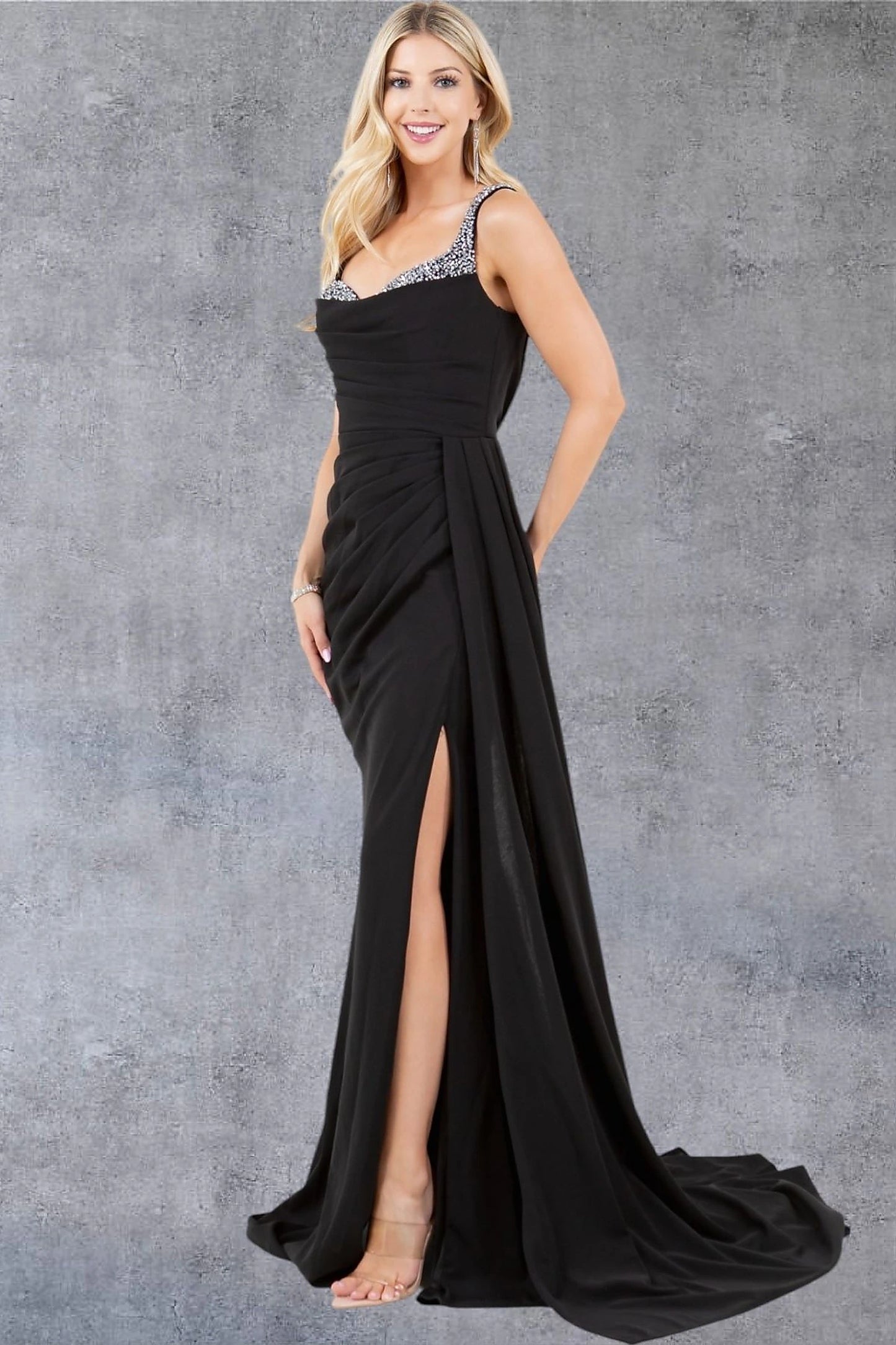Black evening dress completed with thigh-high slit on one side