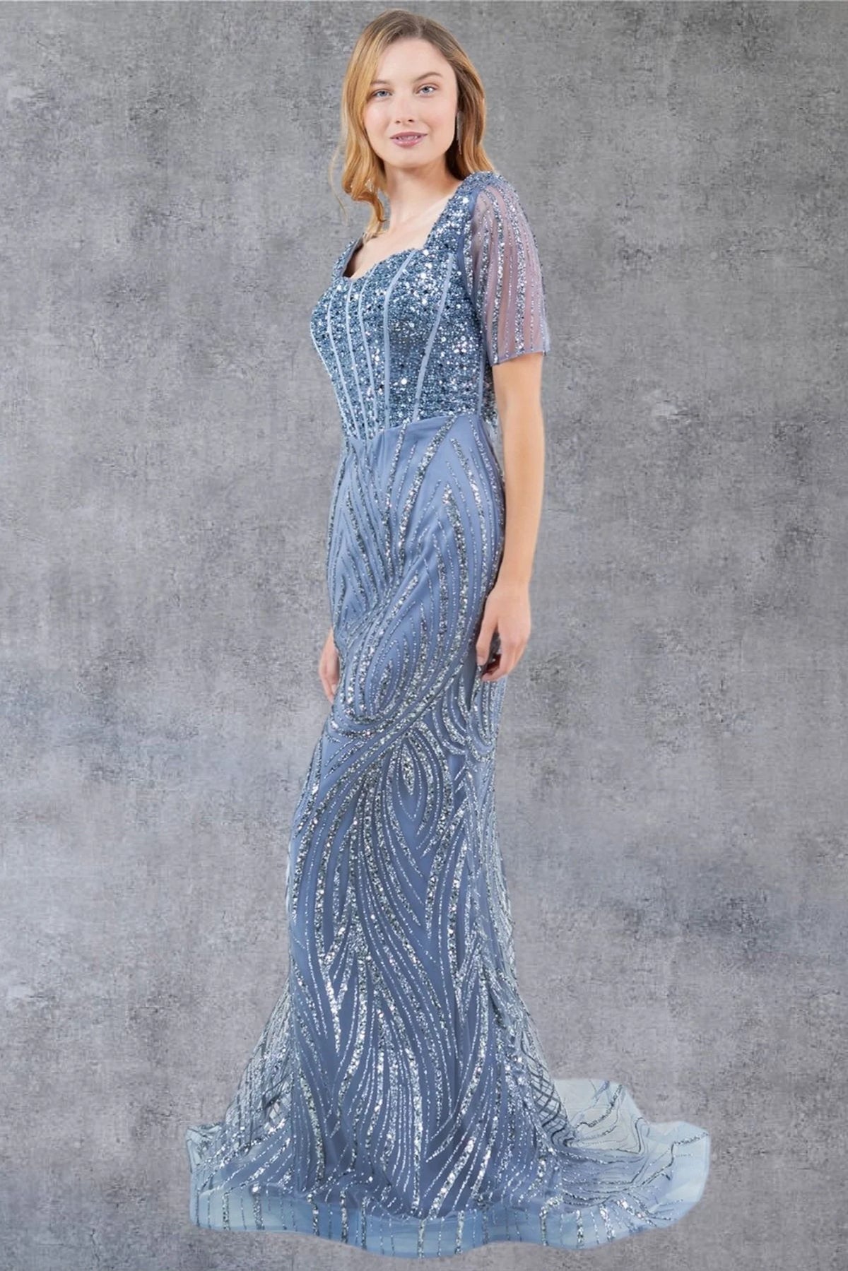 An angled view highlights the sculpted beaded bodice on this Dusty Blue mother of the bride dress.