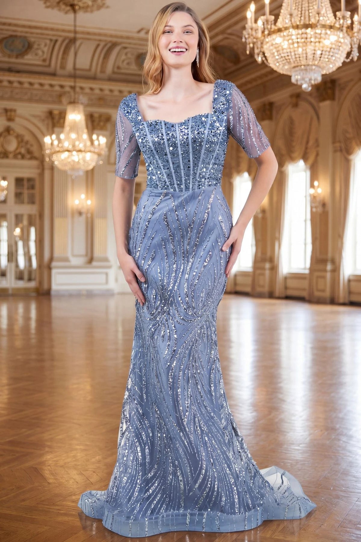 Formal Dusty Blue mother of the bride mermaid dress presents its full beaded silhouette.