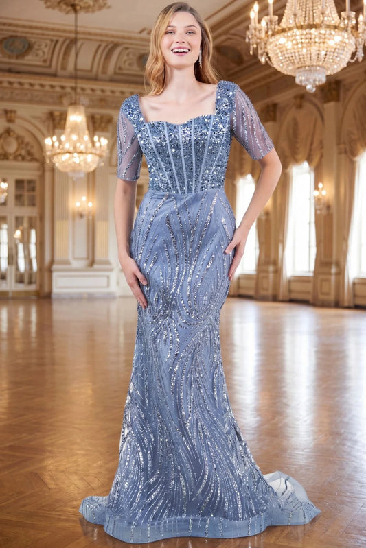 Formal Dusty Blue mother of the bride mermaid dress presents its full beaded silhouette.