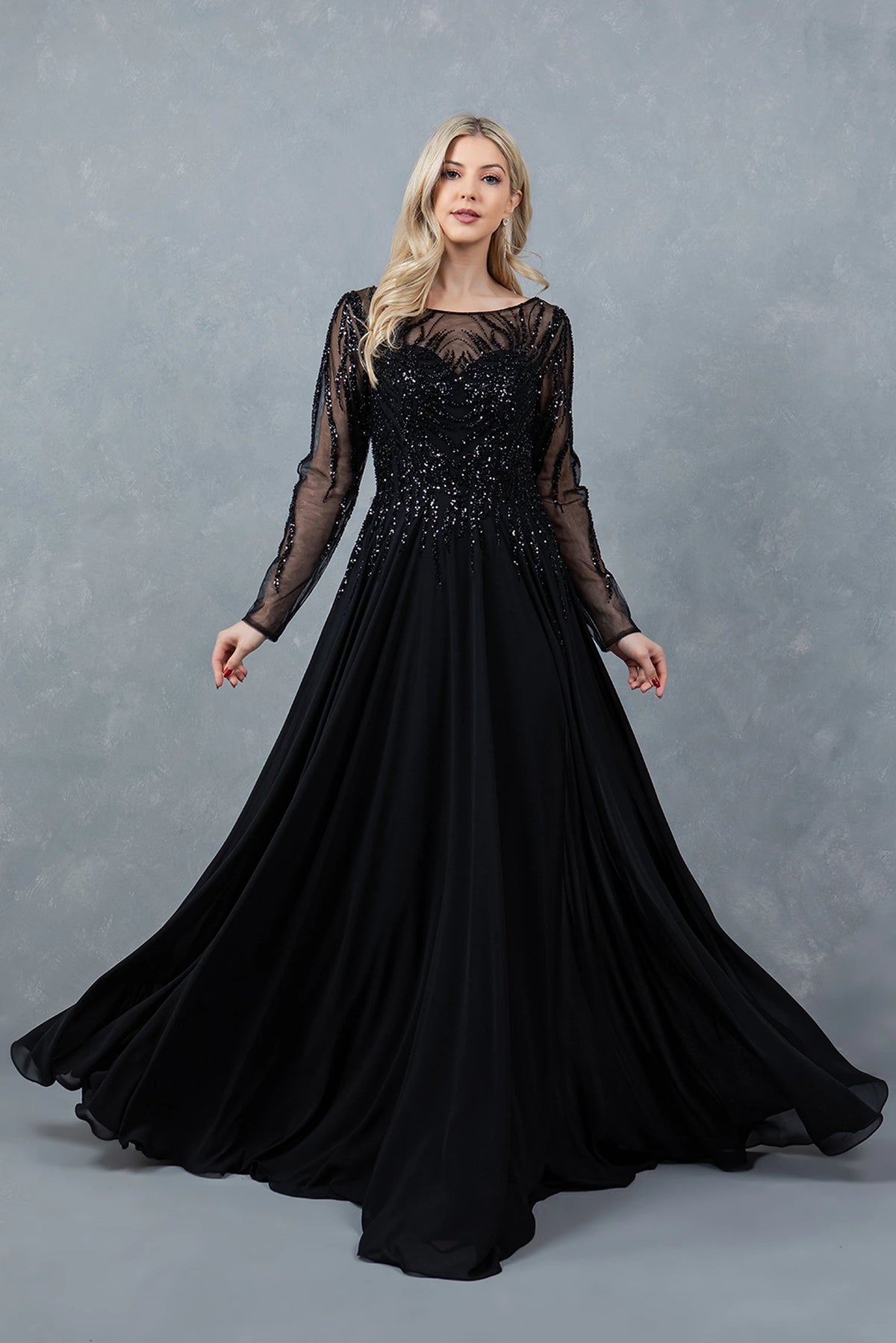 Graceful Black chiffon mother of the bride A-line dress features long sheer beaded sleeves.