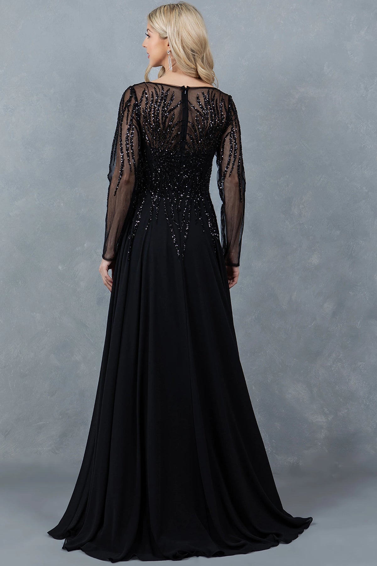 Back styling of the Black mother of the bride dress reveals sheer beadwork above the chiffon skirt.