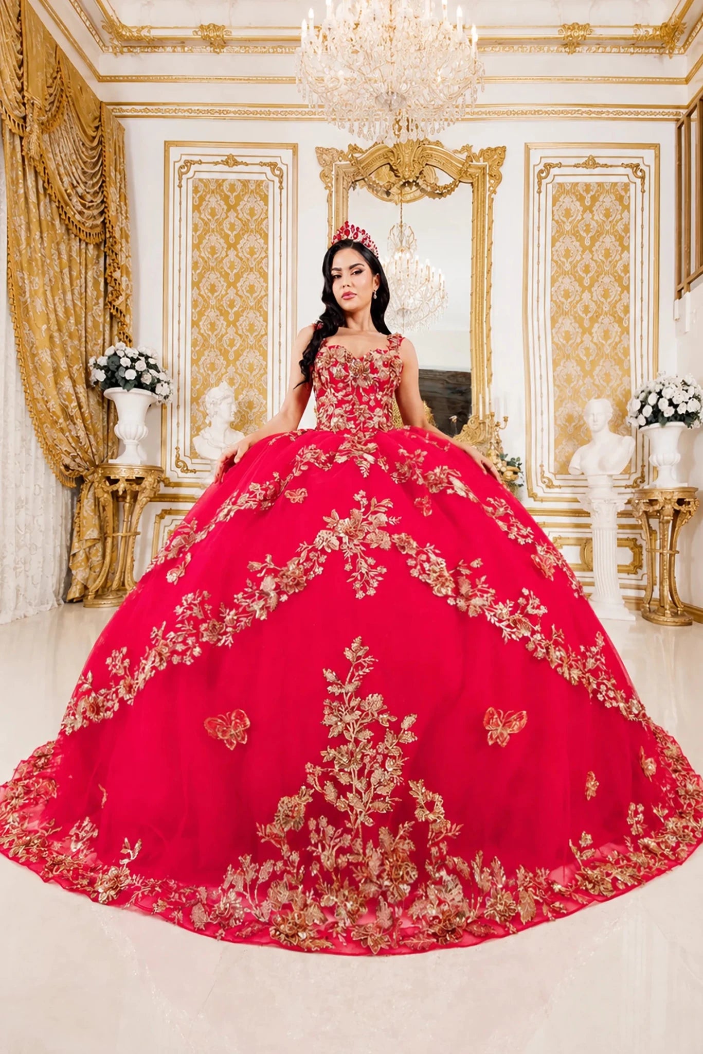 voluminous bright red quinceañera ball gown with extensive gold floral embroidery
