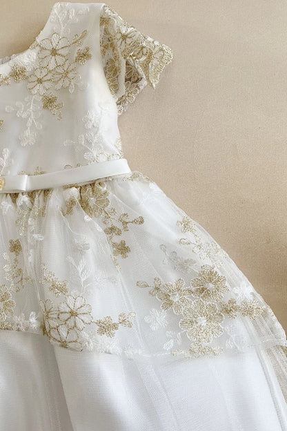 Textured details appear across Baby Off-White flower girl dress with gold floral embroidery. Also suitable as a communion dress. Also.