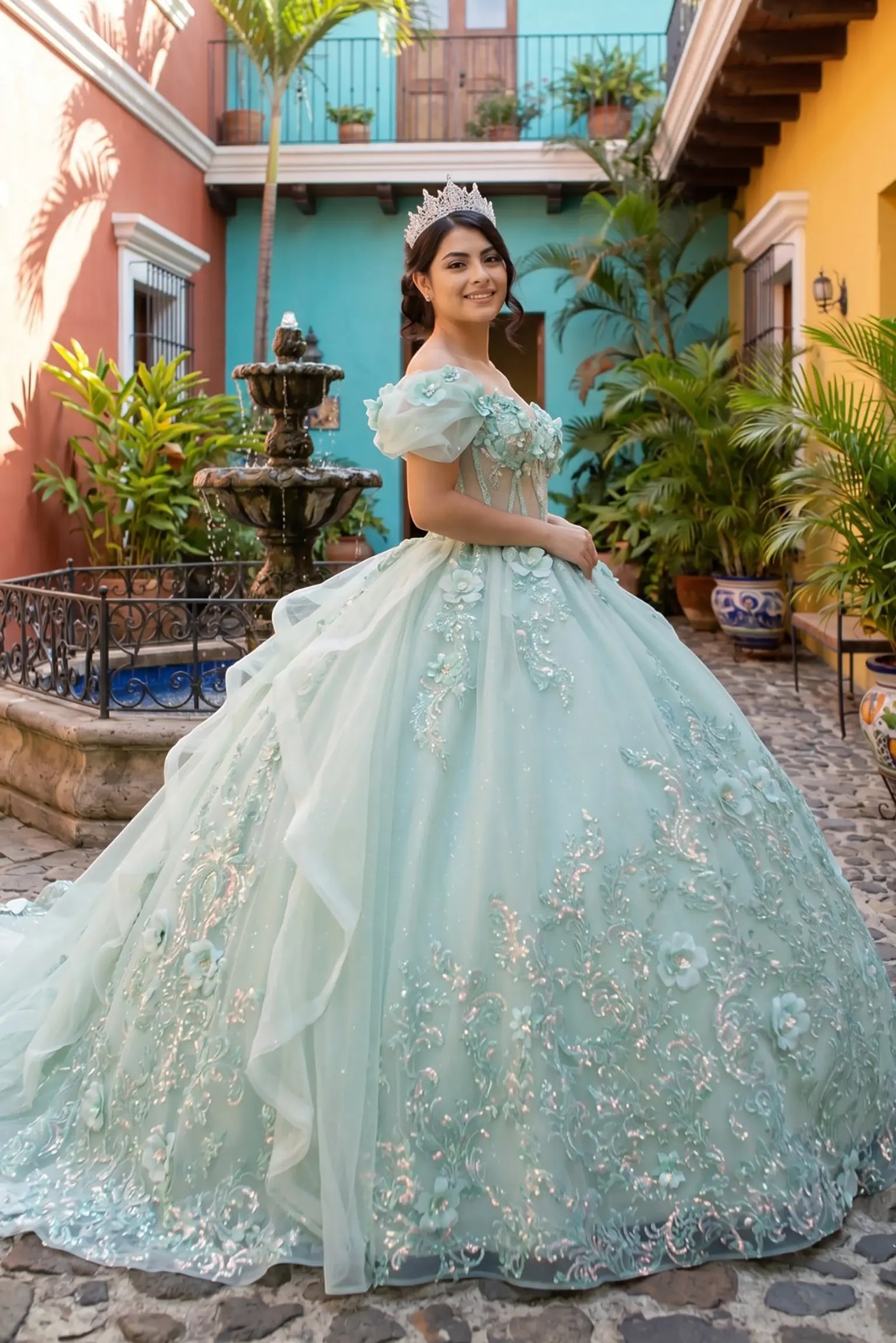 Woman in a sage quinceañera dress with 3d floral details