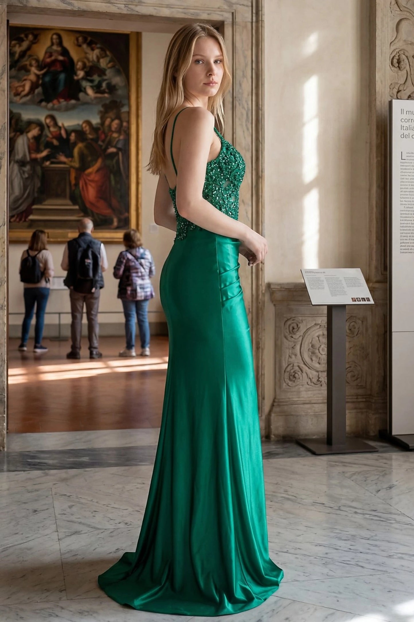 Emerald green prom dress completed with subtle train for movement